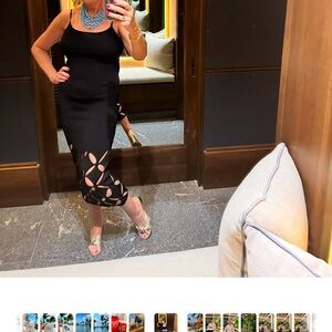 Amazing body hugging dress with cutouts at the bottom. Stunning! Size medium